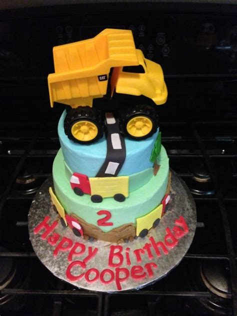 Struggling to buy birthday presents for a toddler? 2-year old boy birthday cake #trucks #dumptruck ...