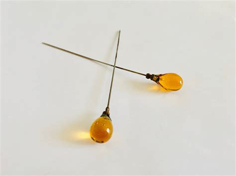 Two Antique Hat Pins Smooth Amber Citrine Colored