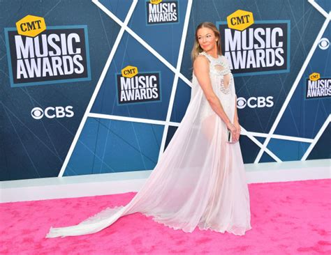 leann rimes at cmt awards 2022 sheer white gown hollywood life