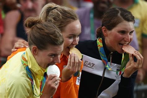 Why Olympians Bite Their Medals The Washington Post