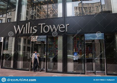 Willis Tower Entrance In Downtown Chicago Illinois With A Well Dressed
