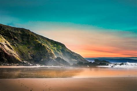 Scenic View Of Beach During Dawn · Free Stock Photo