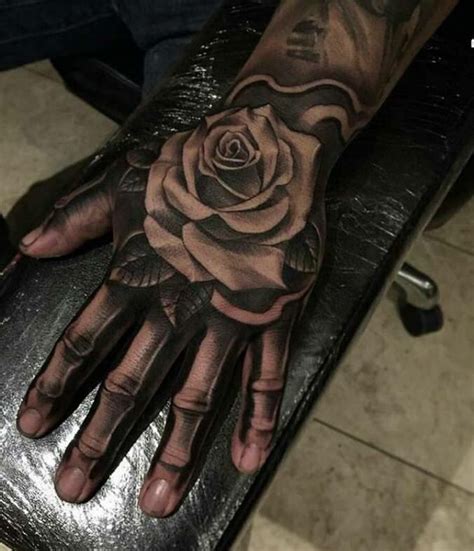 Rose tattoos designs comes into different variety of colors and styles. Rose on skeleton hand | Rose hand tattoo, Hand tattoos ...