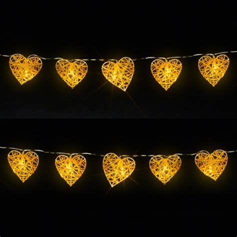 The warm light of these lights will add a rustic touch to any room. Rattan Wicker Heart String Lights