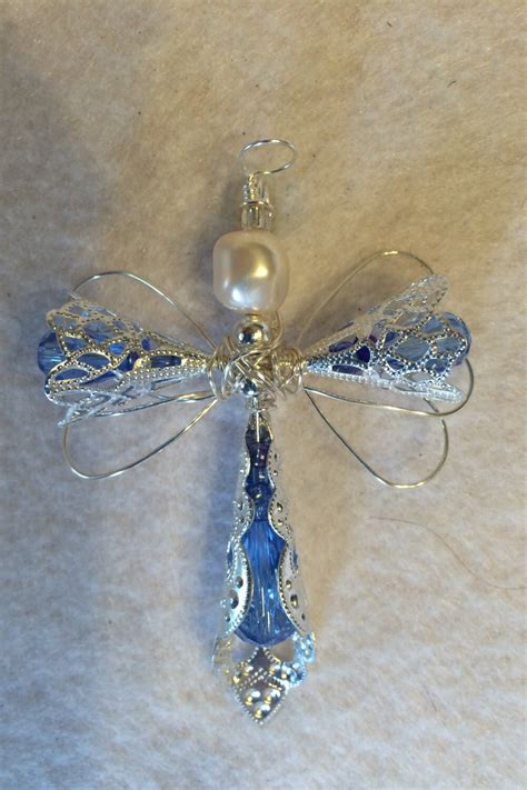 Angel Cross Pendant Med Blue Crystal And Silver