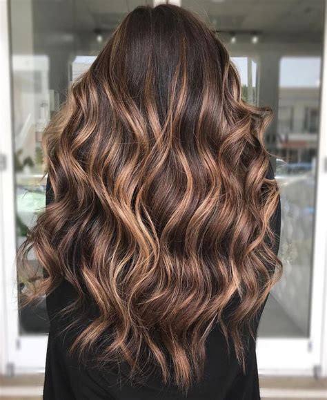 Brown Curly Hair With Caramel Streaks In 2020 Highlights For Dark