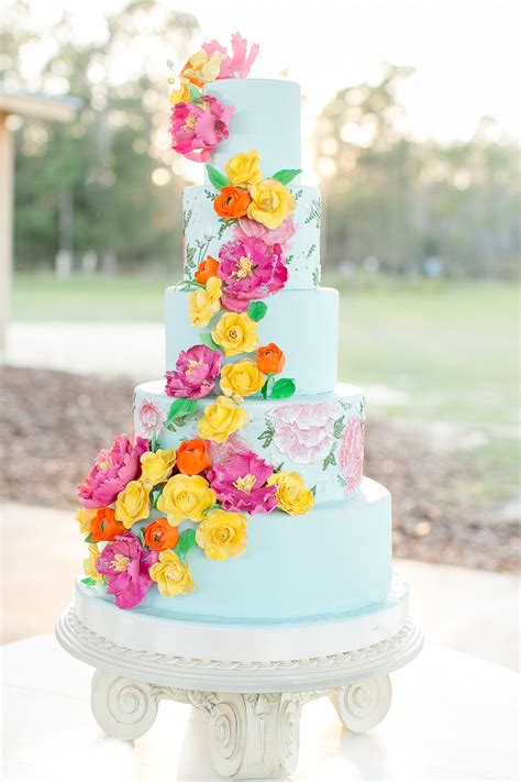 Wedding Cake Covered With Bright Sugar Flowers