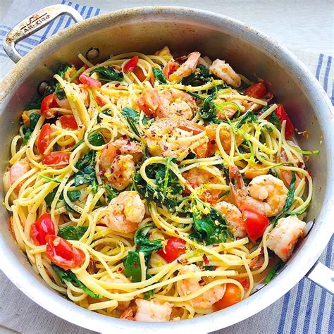 Linguine With Tomatoes Greens And Shrimp In A Buttery Sauce Bomb