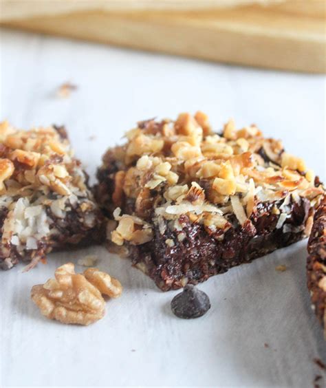 Seven layer keto magic cookie bars have a shortbread crust topped with chocolate hazelnut spread, pecans, coconut, chocolate chips, and gooey caramelized condensed milk. Healthy Magic Cookies - Easy and Gluten Free & Vegan