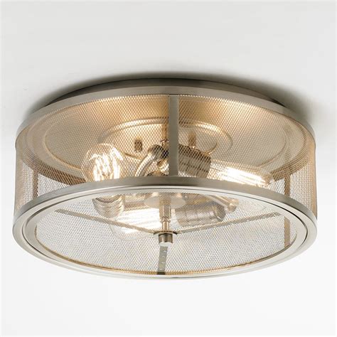 The unusual crossed and single line shade pattern intertwined with gleaming and glittering lines of polished crystals shines in an elegantly modern style. Mesh Industrial Flush Mount Ceiling Light - Shades of Light