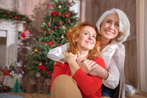 Two Women Embracing Stock Image Colourbox