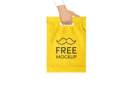 Download Hand holding Plastic Bag Mockup | Mockup World
