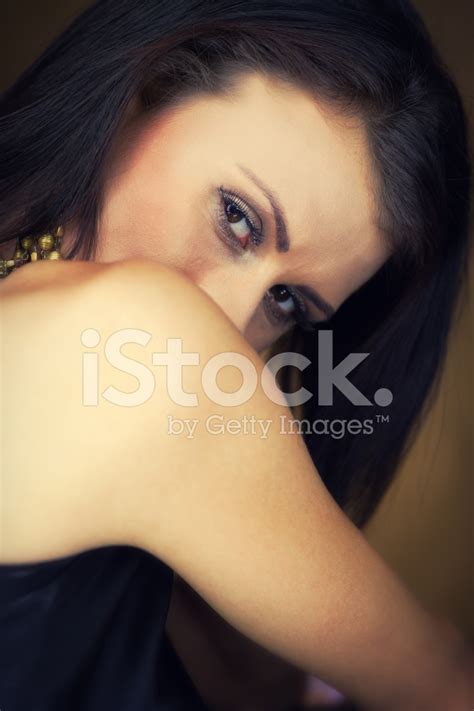 Woman Looking Over Shoulder Stock Photo Royalty Free FreeImages
