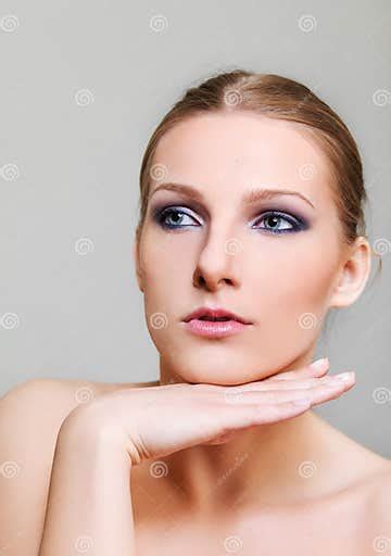 Attractive Blonde Topless Woman With Dark Eye Make Up Stock Image