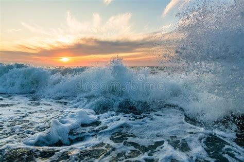 Sunset Ocean Waves Crashing Stock Photo Image Of Splash Clouds