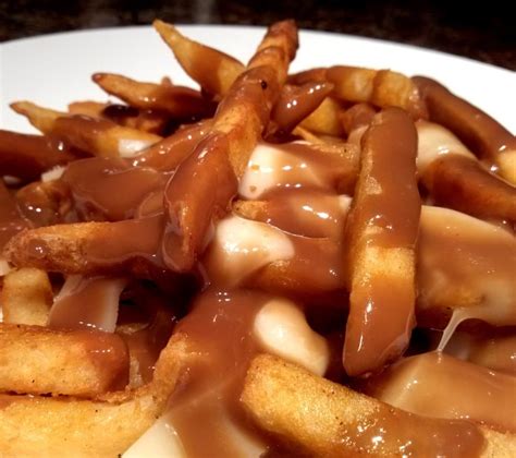 Poutine Yes Please Hot Fries Covered With Melty Cheese Curds And Hot