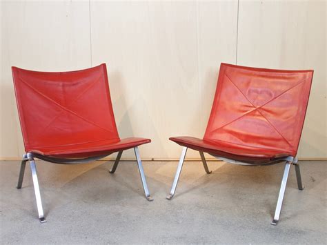 Red PK lounge chair by Poul Kjærholm for E Kold Christensen