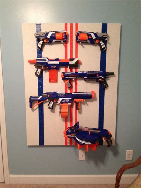 Diy awesome $40 nerf gun rack! Nerf gun rack! | I Loves It | Pinterest