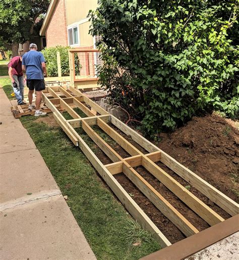 You'll need plywood sheets and sturdy wooden posts to construct a strong, reliable ramp. How To Build A Wooden Ramp Over Stairs | MyCoffeepot.Org