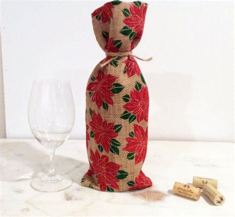 A type of thick, rough cloth used for things burlap. Burlap Wine Bottle Bag Bold Red Pointsetta Motif Dark ...
