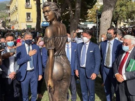 Bronze Statue Of Woman In See Through Dress Sparks