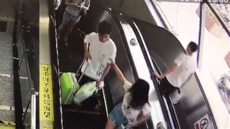 Are You Crazy Brave Woman Grabbed On Escalator Slaps Attacker In Face Before Dragging Him Off