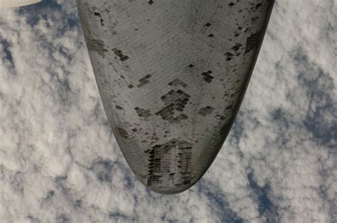 Photo Of Space Shuttles Belly Shows Dings Scientific American