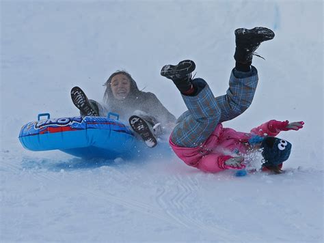 sledding crash two girls lose control of their sled at par… flickr