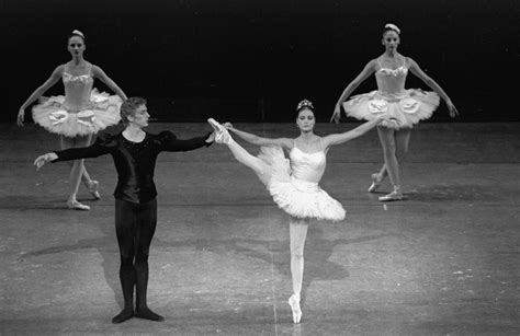 Three Ballerinas In Tutu And Leorboam One Holding The Other S Hand