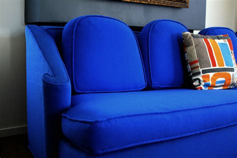 Ideal for giving everyone a seat and anchoring your home's style, your sofa is the centerpiece of your living ensemble. Atomic Score........................: - Awesome Electric Blue Retro Sofa -