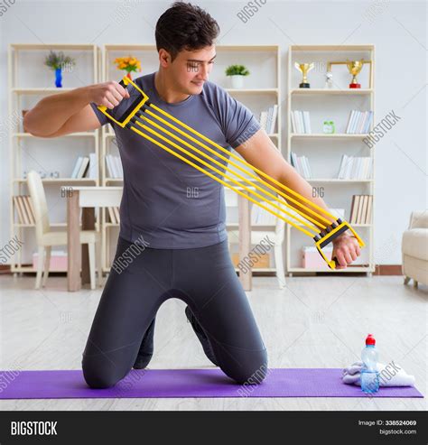 Young Man Exercising Image And Photo Free Trial Bigstock