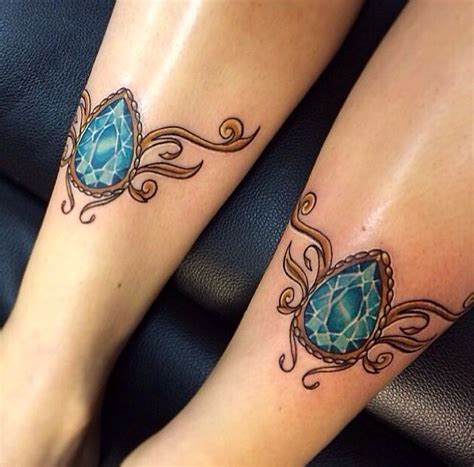 Beautiful Dual Jewel Leg Tattoo The Colours Are Breath Taking Jewel