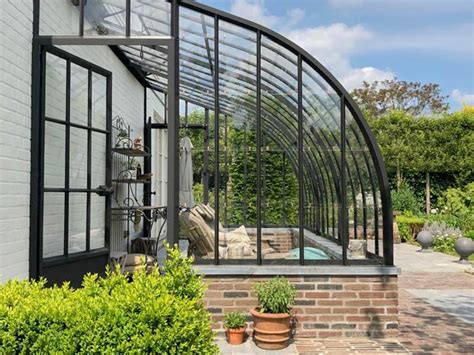 Elegant Veranda With Curved Roof In Wrought Iron And Glass Dbg Classics