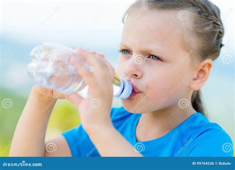 Little Girl Drinking Fresh Water From Bottle Stock Photo Image Of