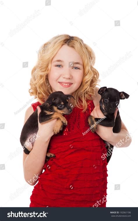 Beautiful Blonde Little Girl Holding Two Stock Photo 192061106