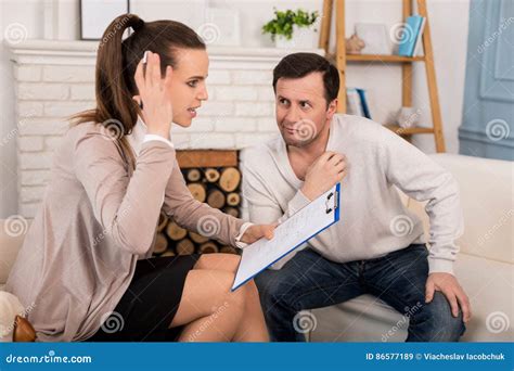 attractive emotional therapist speaking with her patient stock image image of practice
