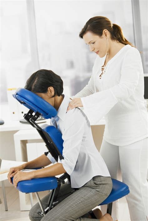 Businesswoman Sitting On Massage Chair Getting Back Massage Serenitys Touch