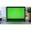 4K Green Screen Of Laptop Computer Set On Working Space In Cozy Office 