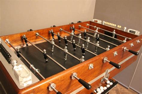 Tournament soccer table and home use foosball. 1930s Wood and Aluminum Foosball Table For Sale at 1stdibs