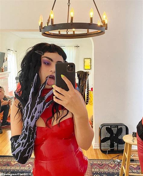 Charli Xcx Is Every Inch The Halloween Vixen In A Busty Red Latex