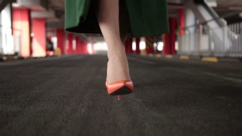 Womans Legs In High Heel Shoes Walking On Road Stock Video Footage 00