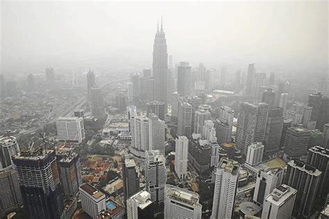 The air pollution index (api) in kuala lumpur reached 97. Haze over KL but readings say its clear - Malaysia Premier ...