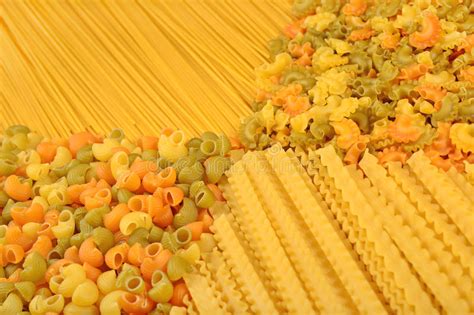 Assortment Of Colored Uncooked Italian Pasta Close Up Stock Photo