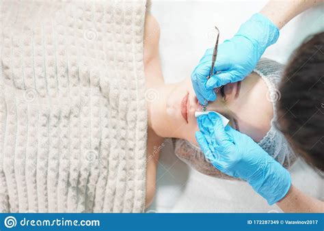 Cosmetologist Doing Mechanical Face Peeling Treatment Stock Image