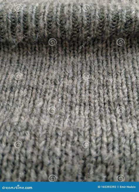 Closeup Of Wool Knitted Pattern For Sweater Clothes As Texture