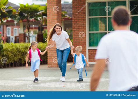 School Pick Up Mother And Kids After School Stock Photo Image Of