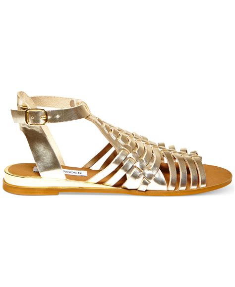 lyst steve madden women s comely flat gladiator sandals in metallic