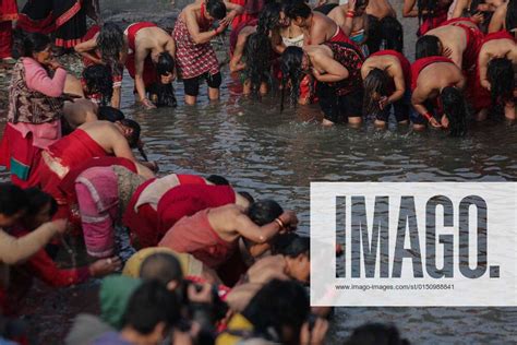 February 16 2022 Bhaktapur Bagmati Nepal A Nepalese Hindu Devotees Takes A Holy Bath In Hanuman