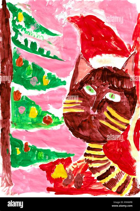 Brown Cat With Red Hat Looking At Christmas Tree Pink Background New