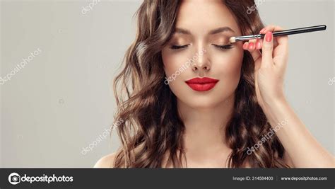 Makeup Artist Applies Eye Shadow Beautiful Woman Face Hand Visagiste